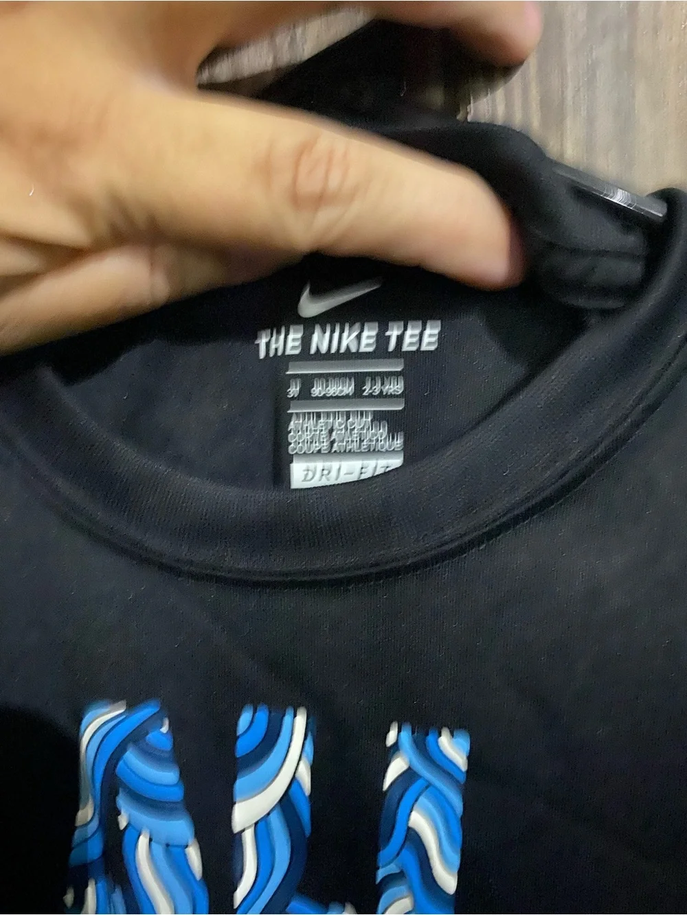 Nike Black Short-Sleeve Tee with Blue Graphic and Orange Swoosh